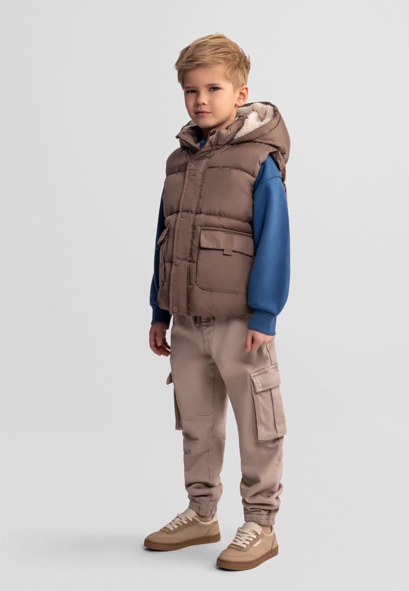 Minoti gewatteerde bodywarmer jongens met capuchon - gevoerd - beige