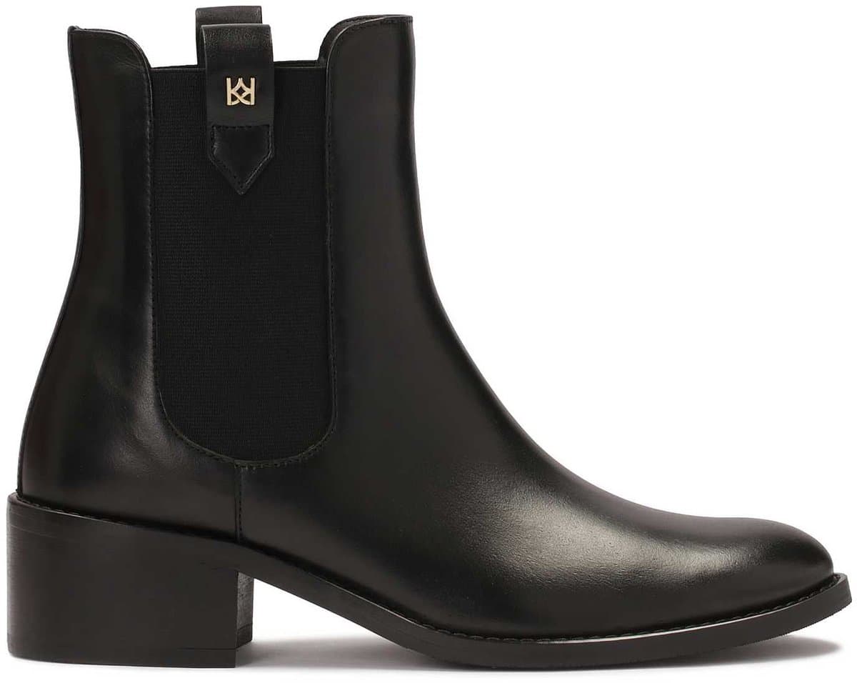 Slip-on black Chelsea boots with elastics and loops